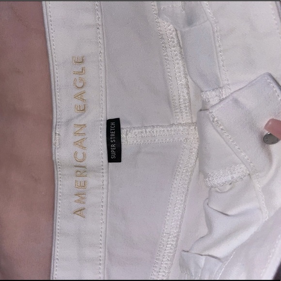 American Eagle Outfitters Pants - white ripped american eagle jean shorts (: